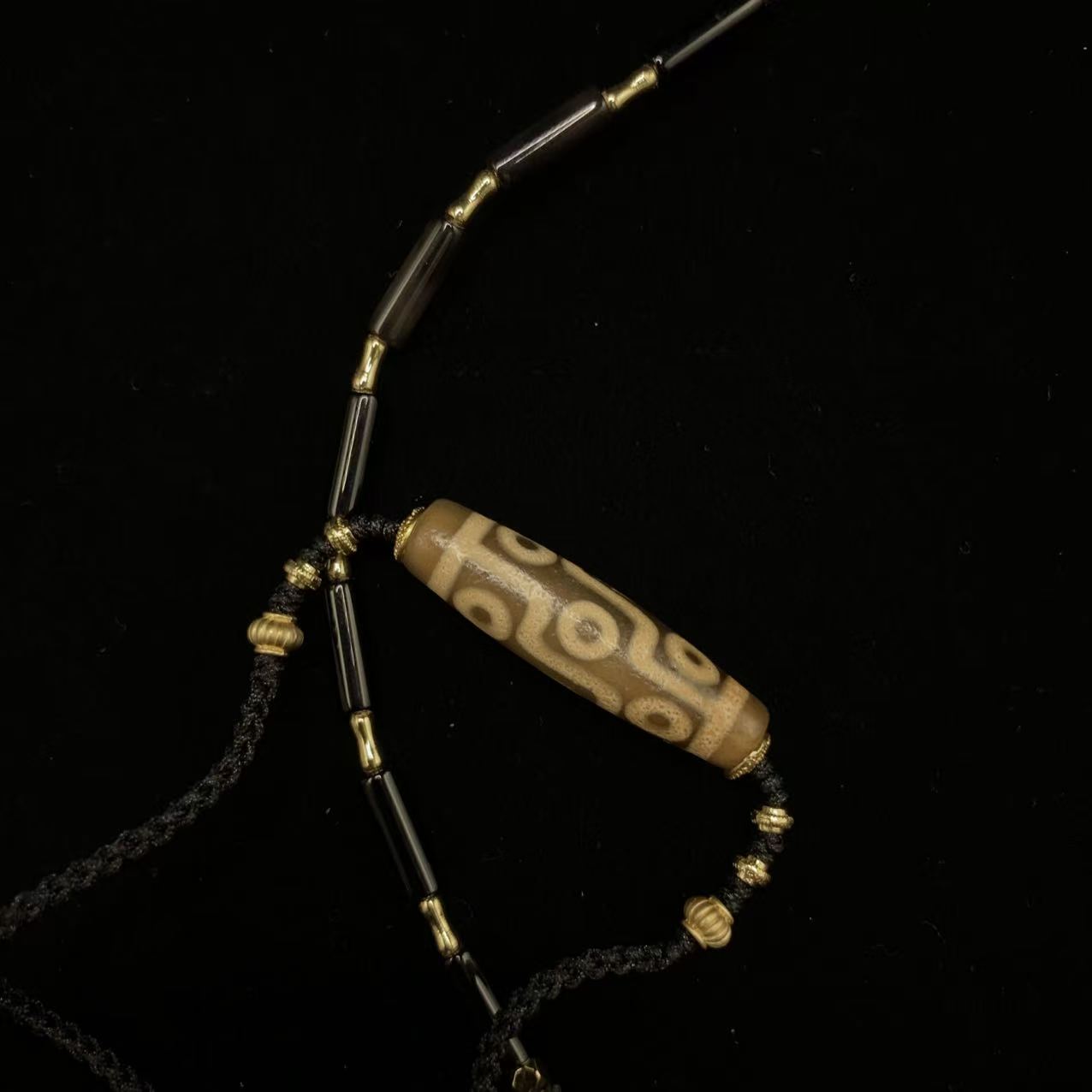 "The Sovereign Nine" Necklace - Ancient Nine-Eyed Dzi Bead with Black Agate & Signature Purple Enamel Badge - Image 2
